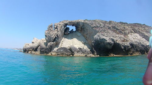 Scenic view of sea against clear blue sky