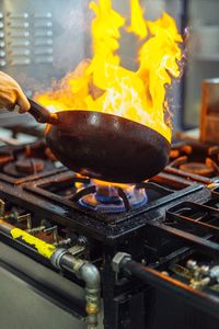 Close-up of fire on barbecue grill