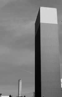 Low angle view of skyscraper against sky