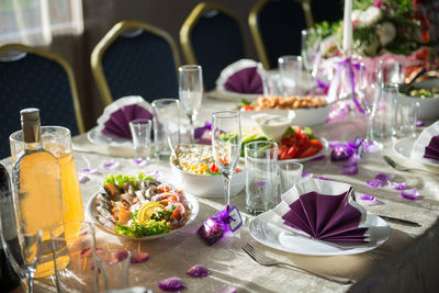 Close-up of food with place setting on table