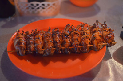 High angle view of squids in plate on table