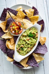 Crispy tortilla chips topped with homemade guacamole.