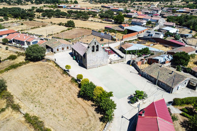 Small town of castilla. air view of the churh and the square