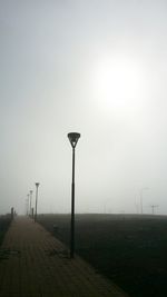 Street light against sky