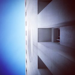 Low angle view of building against blue sky