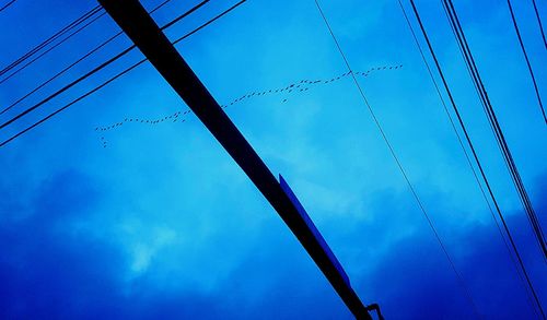 Low angle view of electricity pylon