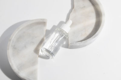 Close-up of glass against white background