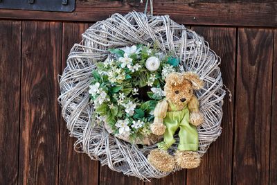 Directly above shot of white flowers in basket on table