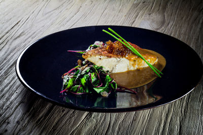 Close-up of served food on table