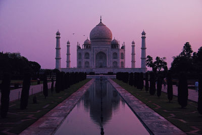 Taj mahal tomb reflected in still waters