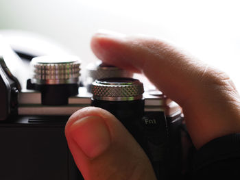 Close-up of hand holding camera