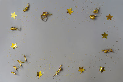 High angle view of leaves on water against white background