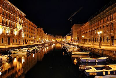 View of illuminated street at night