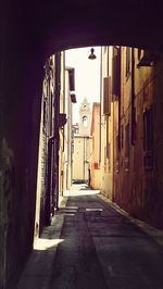 Narrow alley along buildings