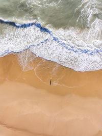 High angle view of waves in sea