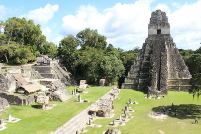 Old temple against cloudy sky