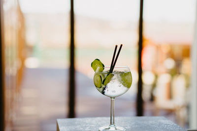 Close-up of drink on glass table