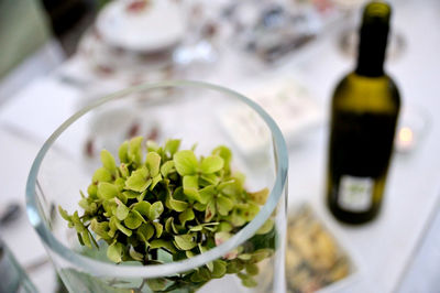 Close-up of wine bottles on table