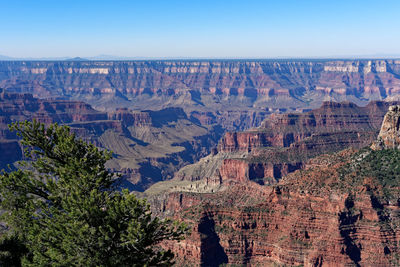 Aerial view of landscape with mountain range in background