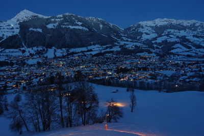 Scenic view of snow covered mountains against sky