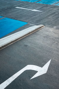 Directional arrows on a parking lot. 