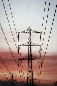 Low angle view of electricity pylon