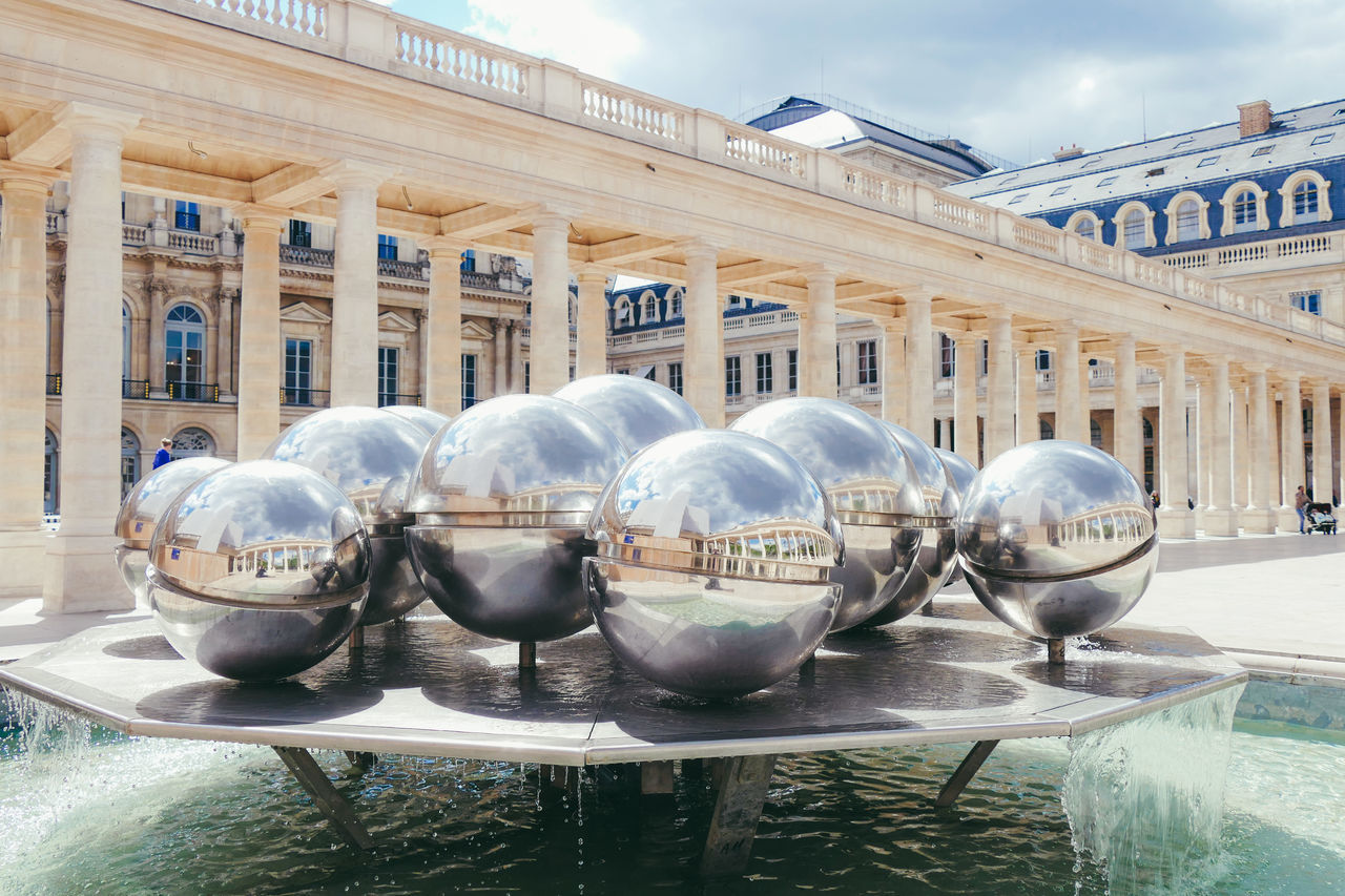 built structure, architecture, building exterior, reflection, city, day, water, sphere, no people, nature, building, outdoors, travel destinations, glass - material, transparent, sky, the past, mode of transportation