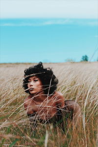 Full length of woman standing on field