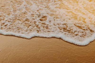 High angle view of sand on beach