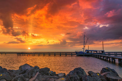 Scenic view of sea against sky during sunset