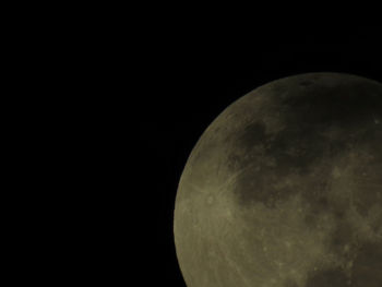 Close-up of ball against black background at night