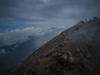 Scenic view of volcanic mountain against sky