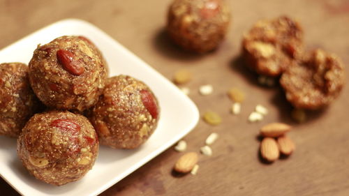 Close-up of dessert balls in plate on table