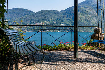 Scenic view of sea and mountains against sky