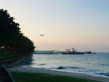 Scenic view of sea against sky during sunset