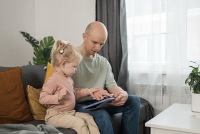 Female friends working at home