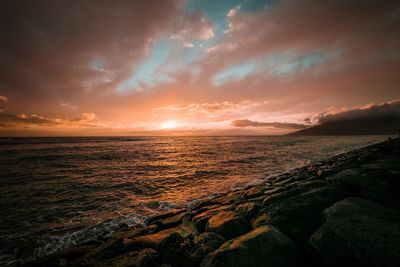 Scenic view of sea against sky during sunset