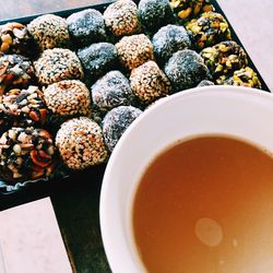 Close-up of tea and cookies on table