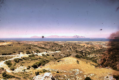 Aerial view of landscape against sky during sunset