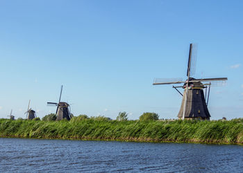 Traditional windmill against clear sky