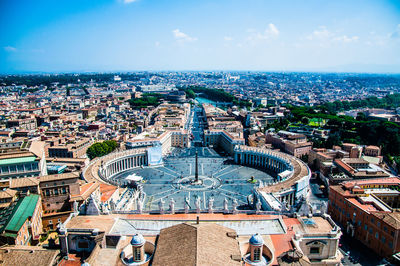 High angle view of city buildings against sky