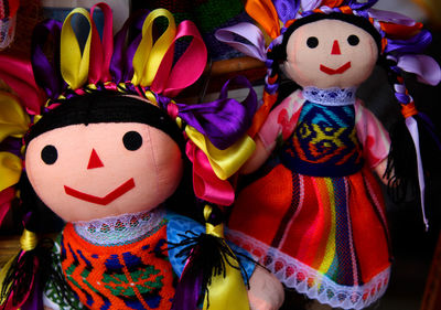 Close-up of toys for sale at market stall
