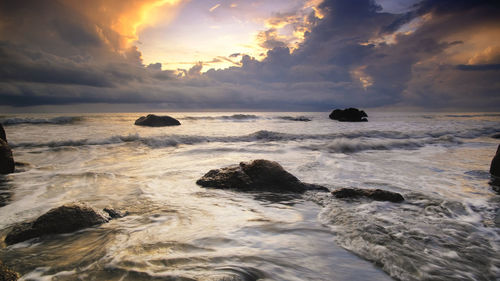 Scenic view of sea against sky during sunset