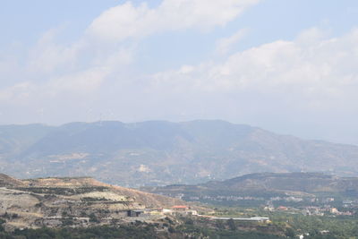 Aerial view of townscape against sky