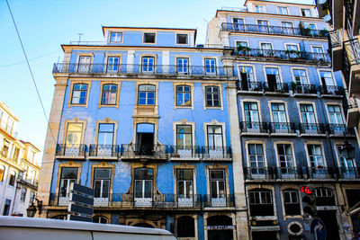 Low angle view of apartment building against sky