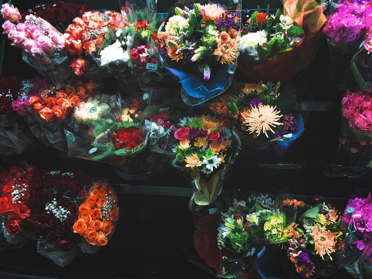 flower, multi colored, variation, high angle view, indoors, no people, fragility, beauty in nature, for sale, nature, flower arrangement, freshness, close-up, day