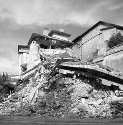 Low angle view of abandoned building against sky