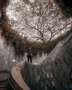 Man and woman walking on footpath