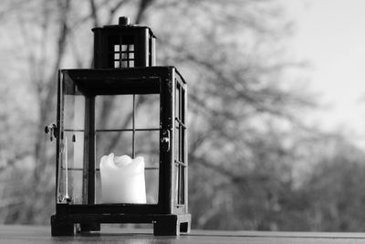 Close-up of lantern on table