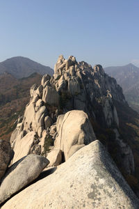 Scenic view of mountains against clear sky